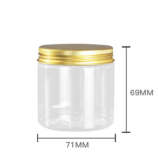 Un pot cosmétique transparent en plastique de 200g avec un capuchon en aluminium doré, conçu pour contenir 200ml de crème.