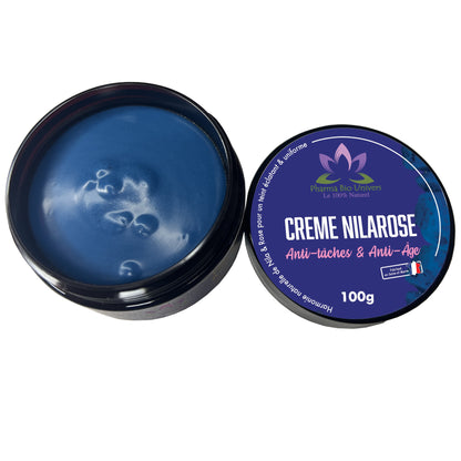 Image de notre Crème NILAROSE, une formule Anti-Taches et Anti-Âge enrichie en Eau de Rose et poudre de Nila. Pot de 100 g pour une peau éclatante et rajeunie.